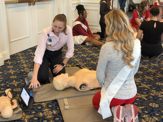 Delaney Basso teaching CPR