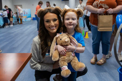 Macy Ware, Director of Children's Miracle Network at the Carilion Clinic Foundation with Children's Miracle Network Ambassador .