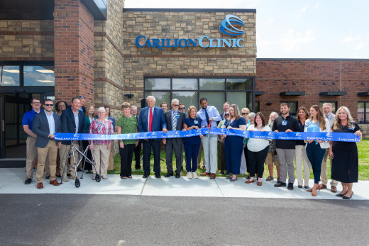 Carilion leaders and community members cut the ribbon outside the new Tazewell Family Medicine location.