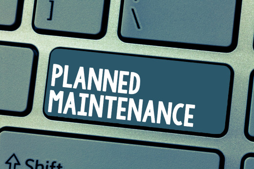 keyboard with the words "planned maintenance"