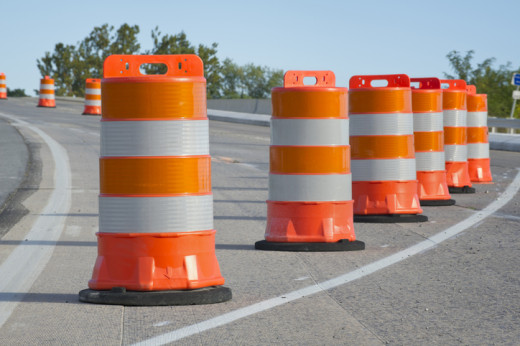 orange barrels used for road lane closure